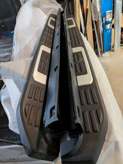 One running board is slightly used, the other is brand new.both have slight blemishes on them.price...