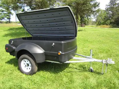 Brand new, Canadian made 4x6 covered utility trailers.