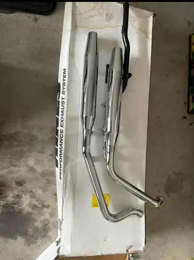 For sale is a set of Harley Davidson motorcycle exhaust pipes, designed to enhance your ride's perfo...