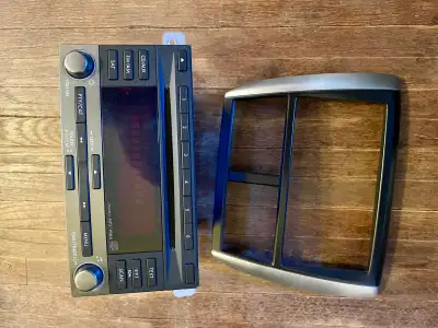 Radio and radio trim for Subaru Forester (2012). Windshield and other parts for Kawasaki Ninja 500R...