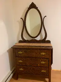 Antique dresser with oval mirror