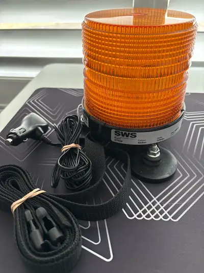 I am selling a used SWS model 27048 amber rotating warning light, perfect for increasing visibility...