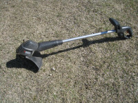 Black and Decker electric grass trimmer, works great.