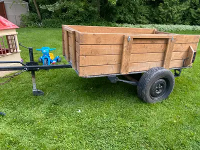 Single axle utility trailer Welded steel frame Pressure treated wood box Swing tongue jack Led light...