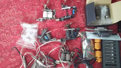 5 tattoo guns with lots of supplies, View more