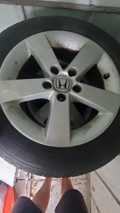 Original honda civic rims. 16 inch. In good condition. They come with tires, but tires are not good...
