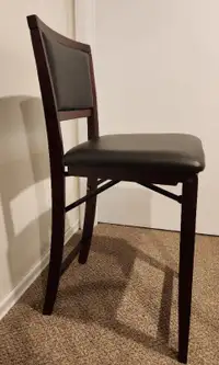 Folding highback bar stool.