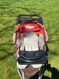 BOB running stroller with fur lining and trays 