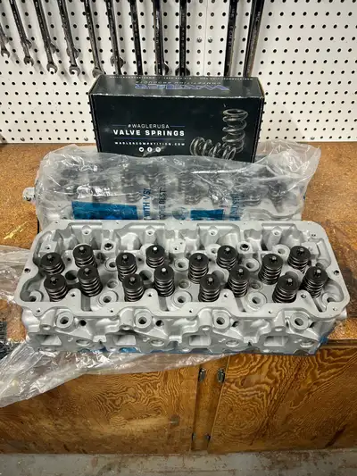 Brand new never installed reman Industrial Injection 2006-10 Duramax cylinder heads with Wagler dual...