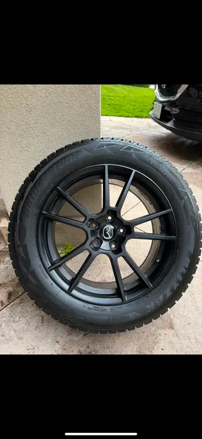 Black Mazda Rim with x4 18 inch Winter tires no scratches on rim, barley used 225/60/18 Tire Size No...