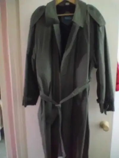 Selling a London Fog Trench Coat that is a versatile and stylish addition to any wardrobe. It's a cl...