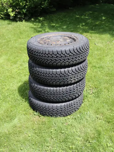 Set of four (4) Goodyear Nordic Winter tires size 205/65R15 on steel rims. Lots of tread wear left....