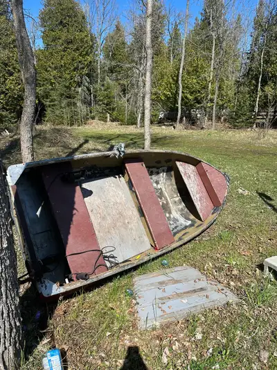 12 foot boat with trailer, and pretty well a brand new 6hp Yamaha, used it 3 times, thought I was go...