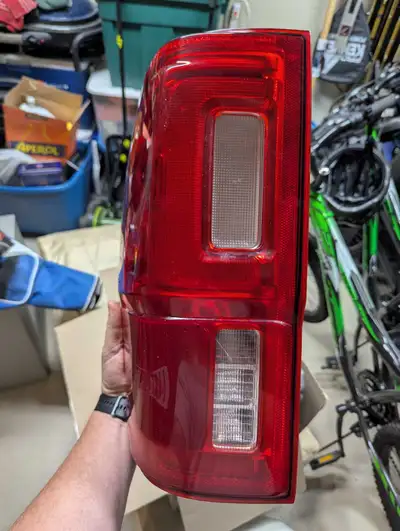 Rear LH taillight assembly with blind spot sensors. Works perfectly, and has slight crack. Put new o...