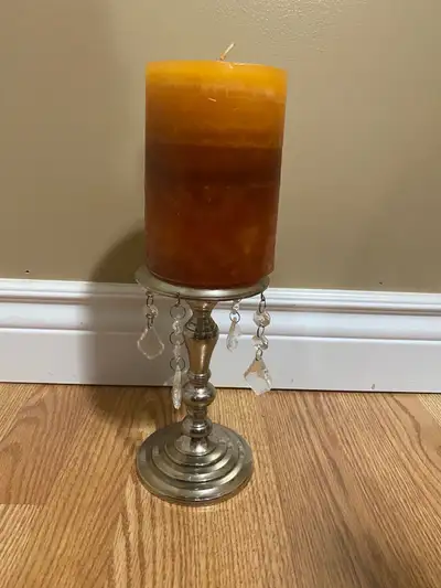 Candle holder with candle, View more