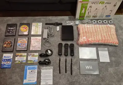 Nintendo Wii + Wii Fit Platform + Controllers + Nunchks + Games, View more