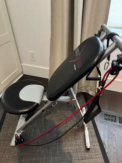 Weider Bungee Bench, designed for a variety of exercises using resistance cords. The bungee cords pr...
