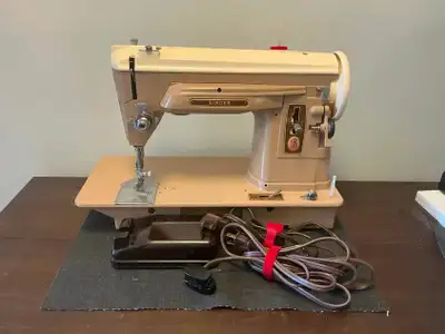 Vintage Singer 404 sewing machine From my personal collection, a Singer 404 straight stitch sewing m...