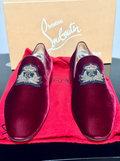 Brand new never been work Size 45 (size 12) Christian Louboutin red velvet loafers.