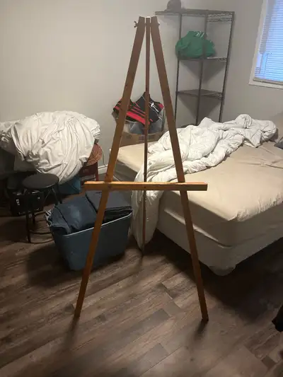 This wooden easel is ideal for artists looking for a sturdy and adjustable stand for their work; it...