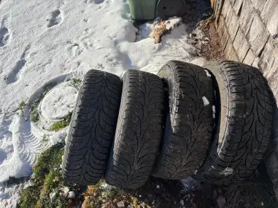 Rims and studded tires off Toyota Corolla 195 65 15