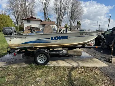 14' Lowe aluminum boat, with 25 hp Johnson and Electric troling motor. No leaks, everything works, g...