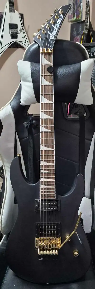 Selling my Jackson X Series Soloist guitar in Black Satin. This guitar feels and plays great!! The p...