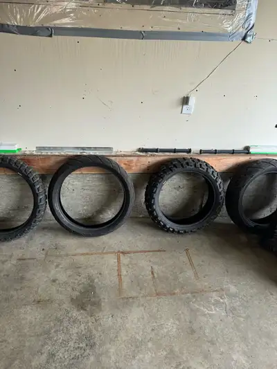 Motorcycle tires, a pair of street and a pair of Off-road Like new off of 2016 KTM 1290 super advent...