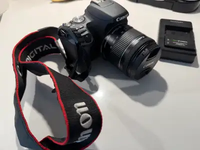 Excellent condition camera comes with two batteries and dual battery charger, along with the lens in...