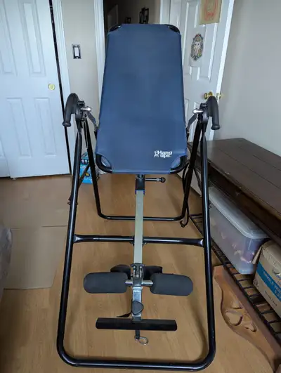 High quality inversion table. Adjustable for different heights. No longer needed. $75.