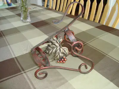 Wrought iron wine bottle holder, View more