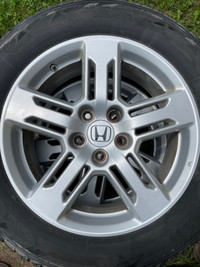 Blizzac tires (235/60/18) on Factory Honda Odyssey rims 5x120