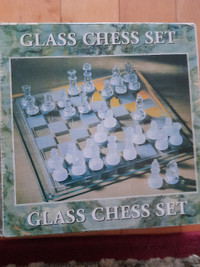 Glass chess set-never used 15. Beckgammon set new 10