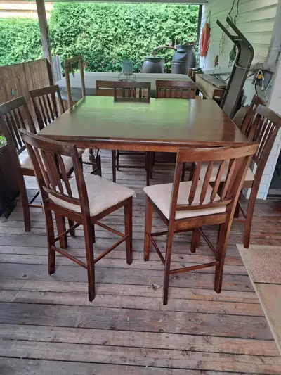 solid wood dining table and 8 chairs, View more
