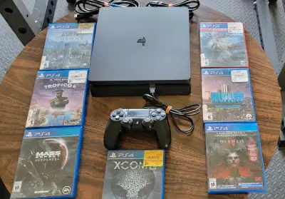 1 TB, PS4 slim for sale. Comes with 7 games. Works perfect. Will deliver. Contact me here or text.