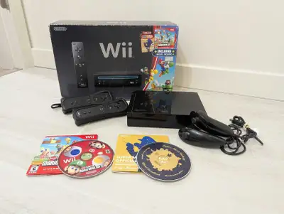 Nintendo Wii with original box, View more