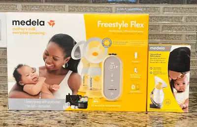 Brand new opened box. Comes with cooler and carrying bag in box. Also includes Medela Silicone Breas...
