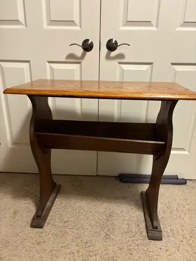 Antique oak library table with book storage from the 1930’s. The antique library table came out of t...