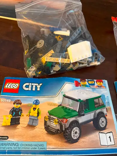 LEGO 60149 City 4x4 with Catamaran Used. 198 pieces. All pieces and 2 books. Pet and smoke free home...