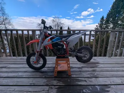 Selling my son's 2022 KTM SX-E 5 (50 CC). He's grown since the fall so time to find a bigger bike. S...