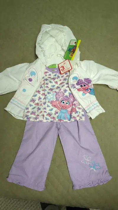 1- New Sesame Street Abby Cadabby 3 piece outfit size 18 months $25.00 2- New Ripzone lilac rain pon...