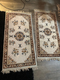 Two rectangle wool rugs 