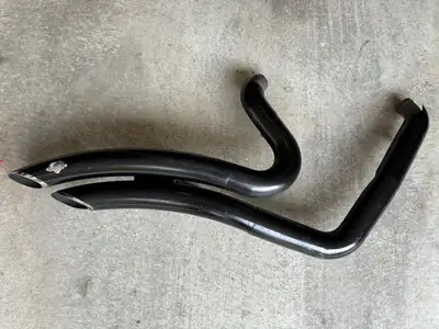 Vance & Hines exhaust pipe for Harley-Davidson 2011 Dyna Street Bob. There are some scratches, but t...