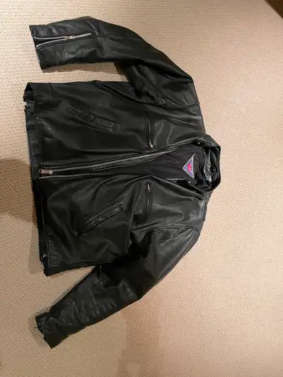 Harley Davidson chaps. Size large. $200.00 Premium lined black Leather motorcycle jacket. Size large...