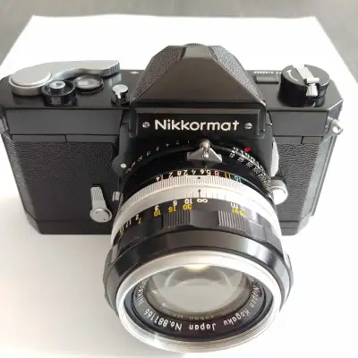 For sale is a used Nikon Nikkormat FT film camera with a fast 50mm f/1.4 lens, perfect for photograp...