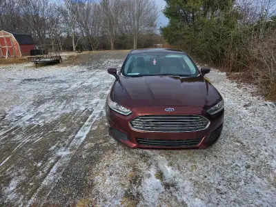 2015 for fusion for sale runs and drives great good on fuel, studded winters tires on vehicle and su...