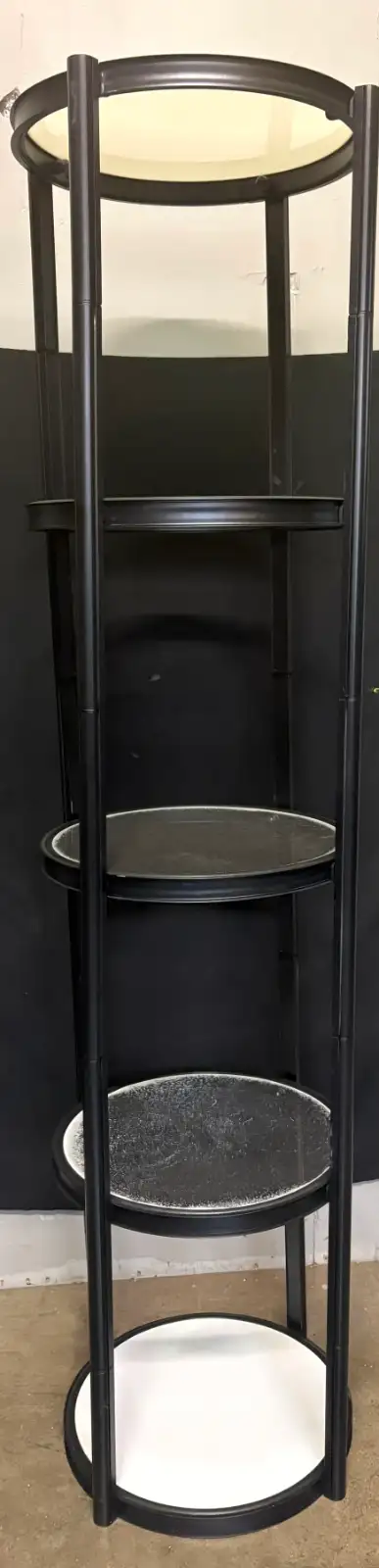 Three round display shelves. They are fully collapsible and lightweight. Perfect for displays at tra...