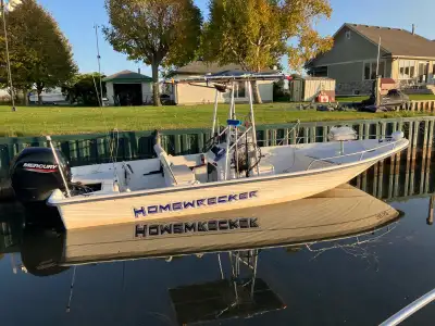 - New 150 Merc 4 stroke 3 seasons ago -Premium stereo system - Live well - 2 batteries with switch -...