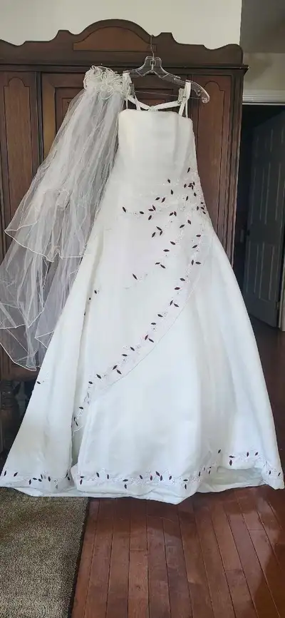 Beautiful $2000 value, worn once, non smoking home, no pets. With vail. With dry cleaning $1000.00