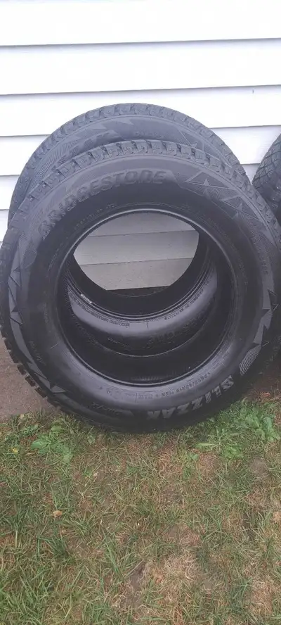 Set of 4 Bridgestone Blizzak DM-V2 winter TRUCK tires. P265/65 R18 112R. Excellent tire and tread co...